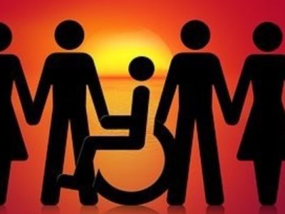 Immagine simbolica che presenta una comunità unita in cui sono presenti persone don disabilità